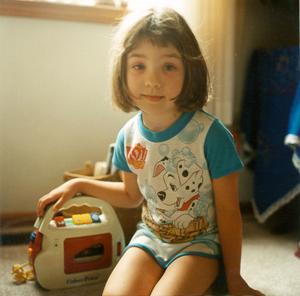 Kaya playing a tape recorder