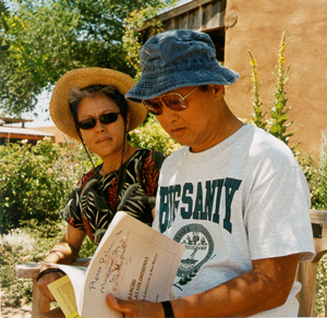 Dad's looking at a brochure about the Ranch