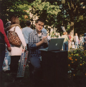 Man with a Laptop and a Smile