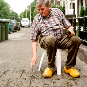 Man with wooden dutch shoes